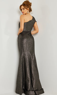 A woman poses with her back to the camera in a Jovani 06751 One-Shoulder Metallic Formal Dress, standing against a plain light background.