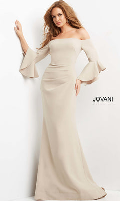 A woman wears the Jovani 07065 Bell-Sleeve Designer Evening Gown, an off-the-shoulder, floor-length beige gown with flared sleeves. The Jovani brand name is displayed beside her.