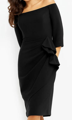 A woman poses elegantly against a white background, wearing the Jovani 07442 Short Wedding Guest Dress in black, designed with an off-shoulder neckline, knee-length hemline, three-quarter sleeves, and a striking side ruffle detail.