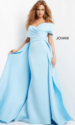 A woman models the Jovani 07443 Long Formal Dress in light-blue, featuring an off-the-shoulder design with a fitted bodice and flowing mermaid skirt, posed against a plain white background with the “JOVANI” brand name visible.