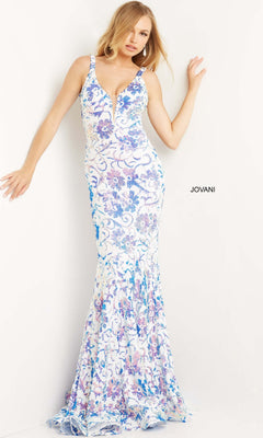 A woman poses against a white wall wearing the Jovani One-Shoulder Long Sequin Prom Dress 08256, a sleeveless floor-length designer gown with blue and purple floral patterns. The "Jovani" label appears in the background.