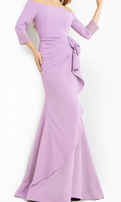 A woman wearing the Jovani 08699 long formal dress in lilac, featuring floor-length styling, off-shoulder design, sequin-trimmed sleeves, and a side ruffle detail, poses against a plain white background.