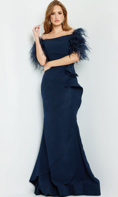 A woman wearing the Jovani Feather-Trim Long Formal Dress 09154 stands against a plain light background.