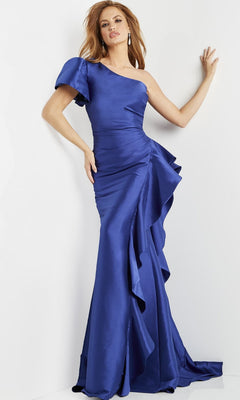 A woman wearing the Jovani 09201 long formal dress in indigo, featuring a one-shoulder design with ruffle details, poses against a light background.
