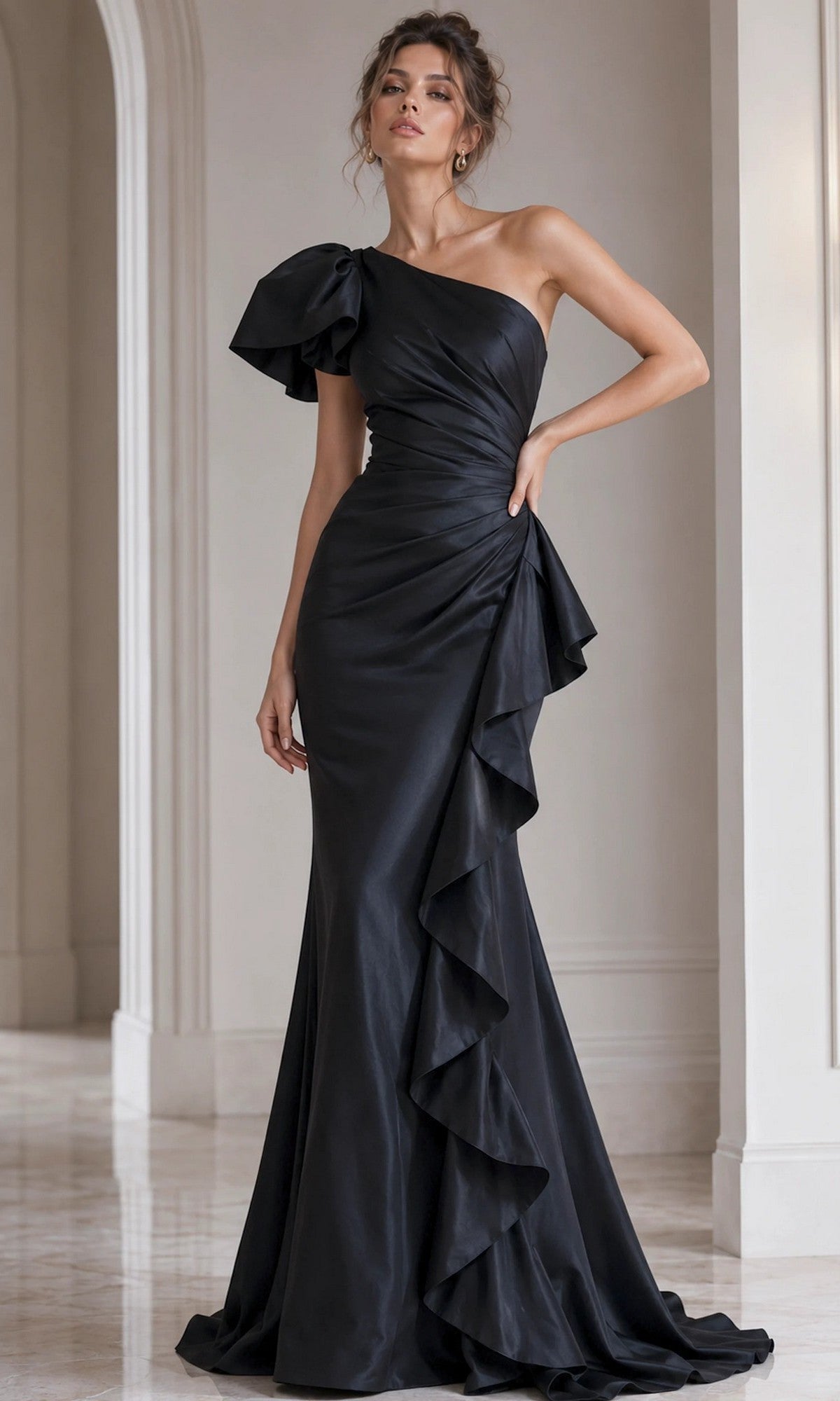 A woman wearing the Jovani 09201 long formal dress in black, featuring a one-shoulder ruffled detail and floor-length hem, stands in a marble hallway.