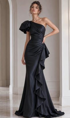 A woman wearing the Jovani 09201 long formal dress in black, featuring a one-shoulder ruffled detail and floor-length hem, stands in a marble hallway.