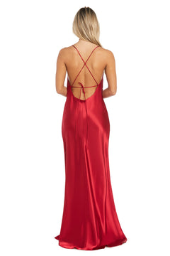A woman with long blonde hair wears the Morgan 10037N, a floor-length, red satin prom dress with a cowl neckline and elegant crisscross thin straps.