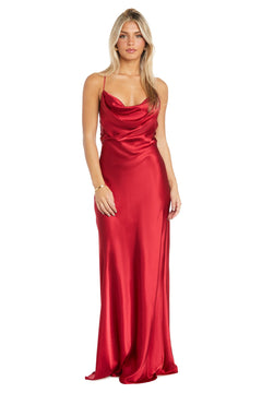A woman wears the Morgan 10037N Cowl-Neck Long Satin Prom Dress in red with thin straps, posing against a plain white background.