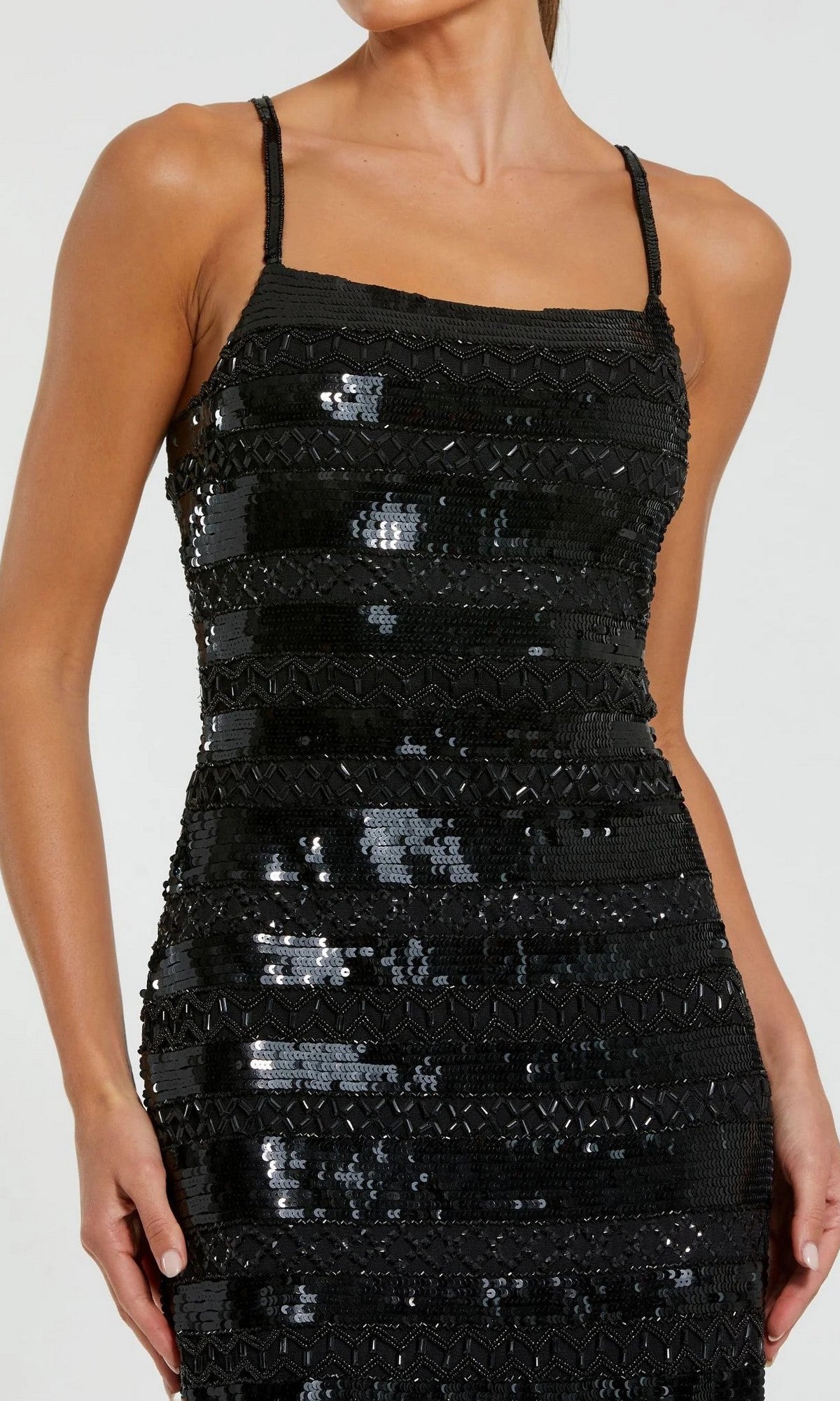 A woman wearing the Midi Party Dress: Mac Duggal 10094, a sleeveless sequin column dress with thin straps, is shown from the shoulders to mid-thigh against a plain background.