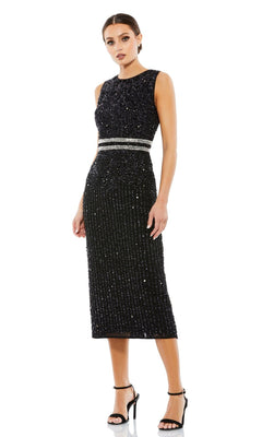 Woman in the Mac Duggal 10509 Short Sequin Wedding Guest Dress—sleeveless, black with silver waist bands—paired with black high-heeled sandals, stands against a white background.