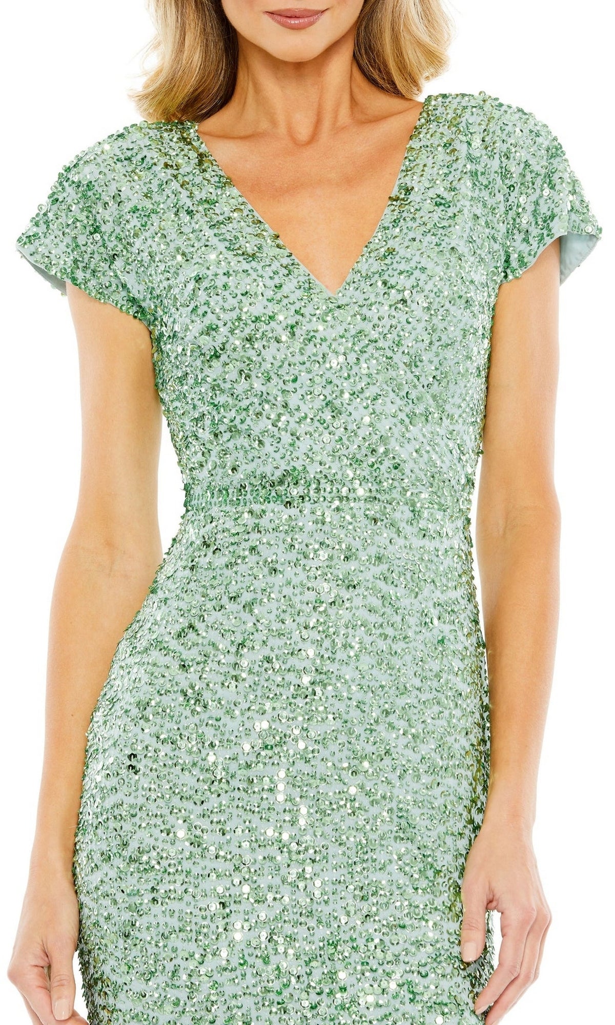 Woman wearing the Mac Duggal 10766 Midi Sequin Wedding Guest Dress in light green with cap sleeves, shown from shoulders to mid-thigh, hands relaxed at her sides.