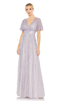 A woman faces forward in the Mac Duggal 10868 Purple Long Sequin Formal Dress, featuring a floor-length silhouette, short sleeves, V-neckline, and sparkling sequin details.