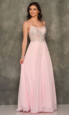 A woman stands against a gray textured background wearing the Dave and Johnny Long Pink A-Line Prom Dress 10970, featuring a sheer embroidered bodice and thin straps.