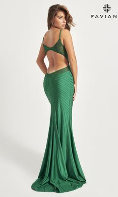 A woman models the Heat Stone Faviana Long Prom Dress 11022, a sleeveless, floor-length green gown with a low back cutout, standing before a plain white background. "FAVIAN" displays in the top right corner to highlight this elegant prom dress.