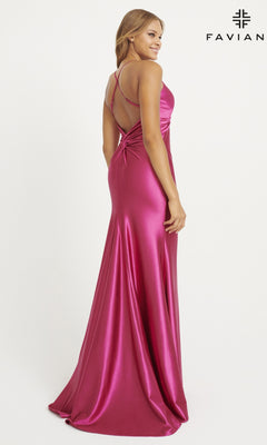 Woman in the Twist-Knot Faviana Long Satin Prom Dress 11034, a floor-length magenta gown with a fitted bodice and criss-cross back straps, stands and glances over her shoulder.