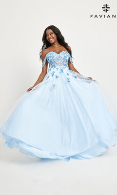 A woman twirls and smiles in the Faviana Off-Shoulder Long A-Line Prom Dress 11059, featuring a sheer corset bodice and floral appliqués. Its fitted top and flowing skirt create an elegant, romantic look against a plain background.