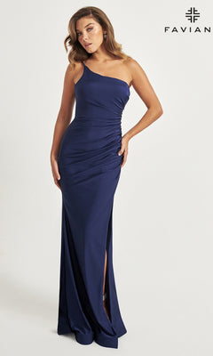 A woman in a navy blue Faviana One-Shoulder Long Prom Dress 11071 with a side slit stands against a plain background. The Faviana logo is shown in the top right corner.