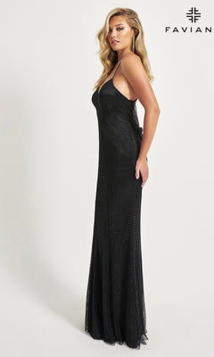 A woman stands sideways against a white background wearing the Back Cowl Faviana Beaded Long Prom Dress 11080, a long black gown with an open back and subtle sparkle. The Faviana logo is in the top right corner.