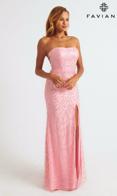 A woman in the Strapless Faviana Long Glitter-Print Prom Dress, a light pink gown with a thigh-high slit and sparkling details, stands before a plain background; the FAVIAN logo appears in the top right corner.