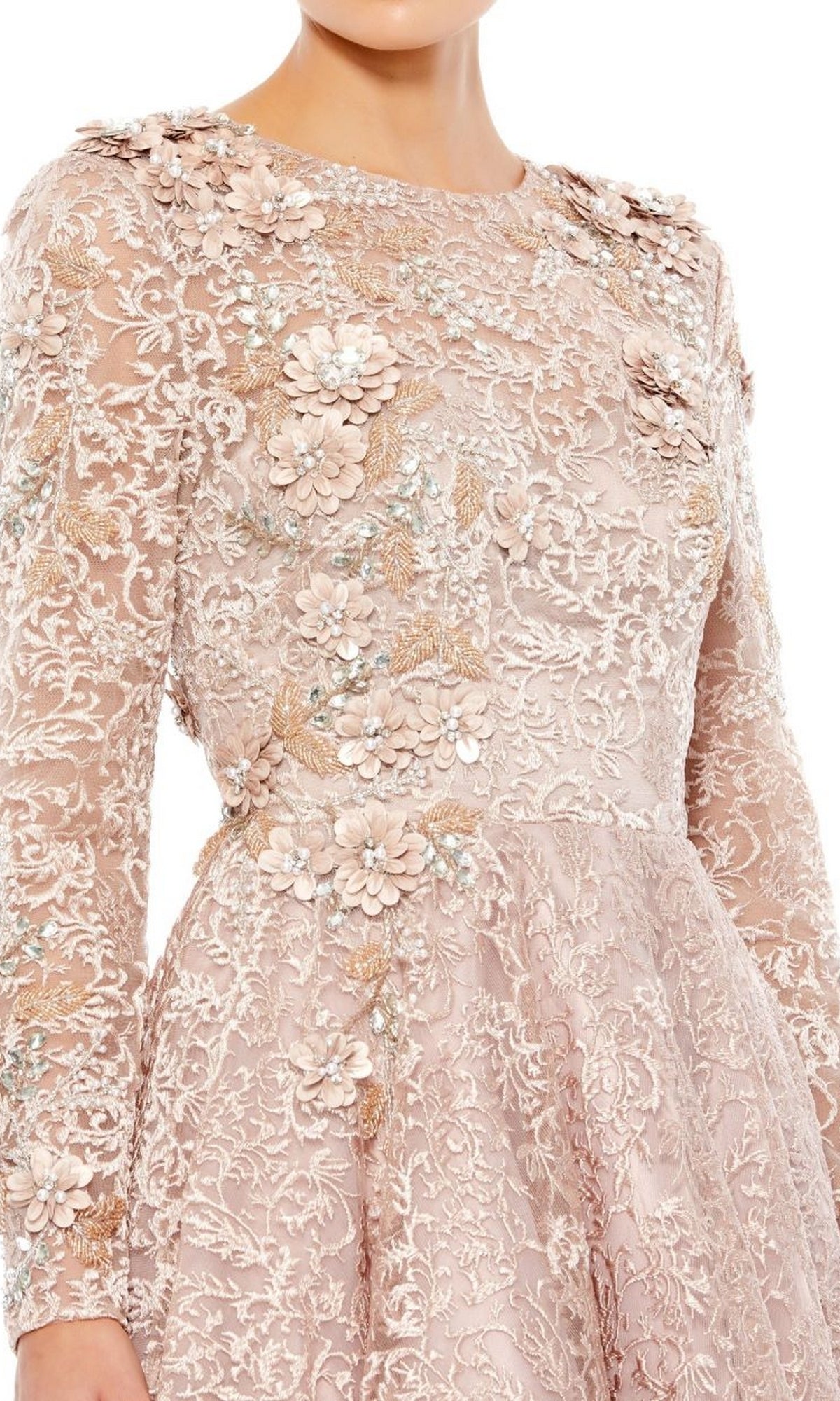 A person wearing the Mac Duggal 11121 Long Sleeve Mocha Formal Gown featuring elegant lace, floral appliqué, and intricate embroidery.