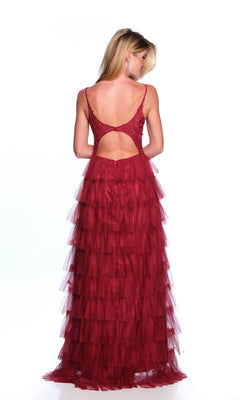 A woman faces away from the camera against a white background, wearing the Dave and Johnny Long Tiered Prom Dress 11148—a sleeveless, backless red prom dress with layered tulle ruffle tiers.