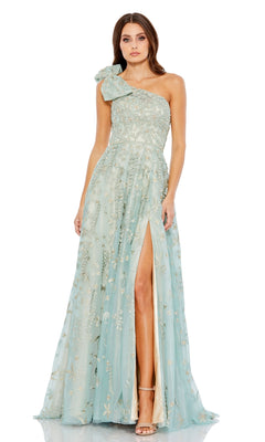 A woman wears the Sage One-Shoulder Formal Dress by Mac Duggal (11177), featuring floral embroidery and a high slit, standing against a white background.