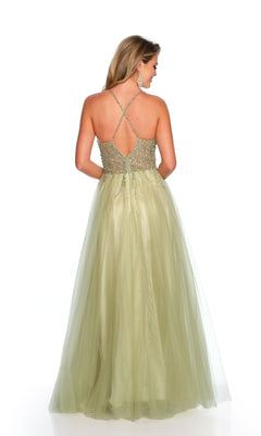 A woman in the Dave and Johnny Long Prom Ball Gown 11202 with a light green sheer tulle skirt and beaded bodice faces away, highlighting the elegant crisscross back straps.