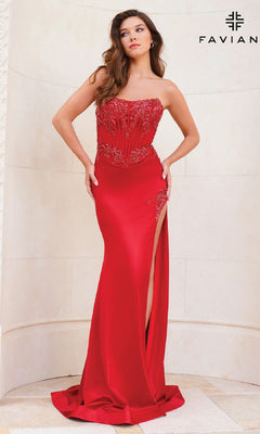 A woman in the Strapless Long Corset Prom Dress: Faviana 11209, featuring satin fabric, beaded details, and a high slit, stands by a light wall. The "FAVIANA" logo appears in the top right corner.