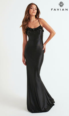 A woman poses against a white background in the Faviana 11249 Long Prom Dress—a fitted, floor-length black gown with bead embellishments and rosette detailing on the bodice. The Faviana logo is displayed in the top right corner.