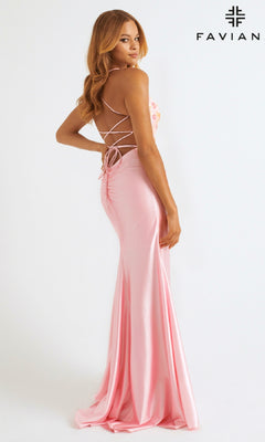 A woman poses against a white background in the Faviana 11252 long pink bodycon stretch satin prom dress, featuring an adjustable lace-up open back. "FAVIAN" is displayed in the top right corner.