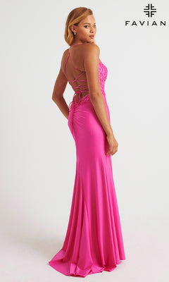 A woman in a vibrant pink, floor-length Faviana 11264 prom dress with a lace-up back stands slightly turned; the sparkling beaded bodice catches the light as the Faviana logo appears in the corner.
