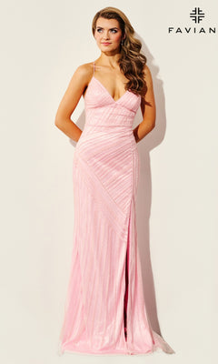A woman wears the Faviana 11270, a light pink, floor-length beaded prom dress with thin straps and a v-neckline, standing against a light background. The "FAVIAN" logo is visible in the top right corner.