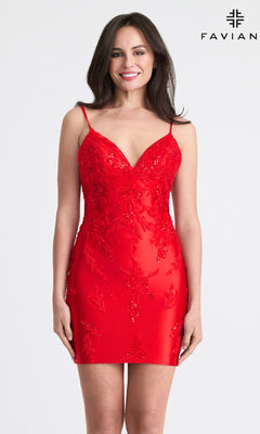 A woman wears the Faviana 11315 Beaded Short Sheath Hoco Dress in red, featuring a fitted, sleeveless design with lace details and strappy back. "FAVIAN" and the logo are shown in the top right corner against a plain background.