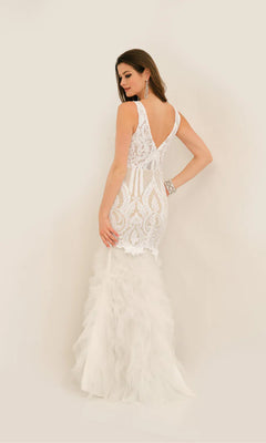 A woman models the Long Formal Dress 11325 by Dave and Johnny—a sleeveless white lace mermaid gown with a low back and tiered tulle skirt—posed against a plain light background.