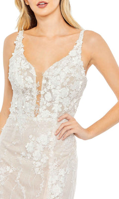 A woman wearing the Long Formal Dress 11331 by Mac Duggal, featuring a white color and plunging v-neckline.