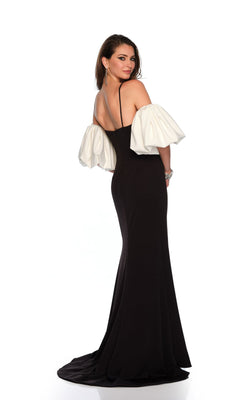 A woman models the Long Formal Dress 11368 by Dave and Johnny—a fitted black gown with white puff sleeves—while standing and looking over her shoulder against a white background.