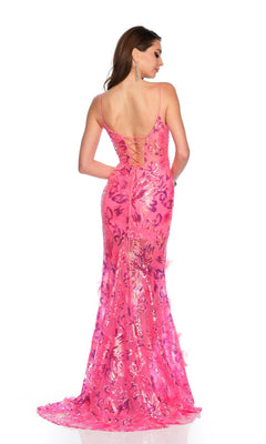 A woman stands facing away from the camera in the Long Formal Dress 11388 by Dave and Johnny, a fitted fuchsia pink gown with sparkling sequins and lace-up back detail.