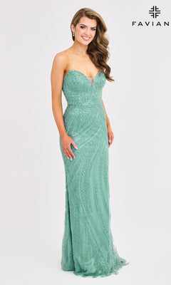 A woman models the Faviana 11408 long prom dress—an aqua green, strapless, floor-length gown with intricate beaded details—posing elegantly against a plain white background.
