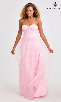 A woman wears the Faviana 11418 Long Prom Dress, featuring a strapless corset bodice and subtle swirl pattern, holding the sides of its floor-length pink skirt. "FAVIANA" is displayed in the top right on a plain background.