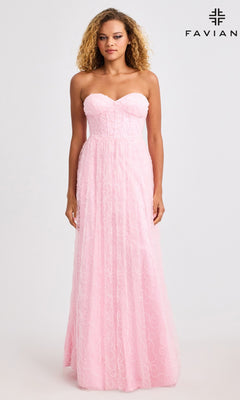 A woman models the Faviana 11418 long prom dress—strapless with a corset bodice and floor-length pink gown featuring a subtle swirl pattern—against a plain background. "FAVIANA" and its logo appear in the top right corner.