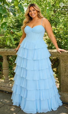 A person wears the sky blue, floor-length chiffon Faviana 11420E Long Plus-Size Prom Dress, featuring a sweetheart neckline and corset-style bodice, while leaning against a stone railing.