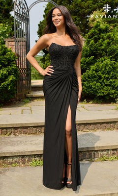 A woman models the Faviana 11445 long prom dress, featuring a strapless beaded corset bodice and thigh-high slit, while standing outdoors on stone steps surrounded by greenery.