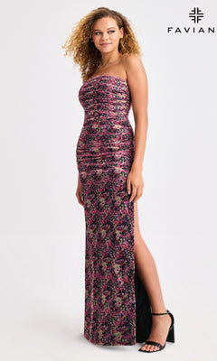 A woman in profile wears the Faviana 11461 long prom dress—strapless, fitted, ruched floral print with a high slit and lace-up back—posed against a plain background. "FAVIAN" logo appears at the top right.