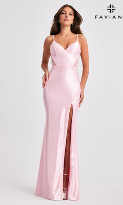 A woman wears the Faviana 11466 long prom dress—a fitted light pink satin gown with thin straps, lace side panels, and a thigh-high front slit. The "Faviana" logo is displayed in the upper right corner.