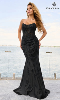 A woman wears a black, floor-length, strapless Faviana 11600 prom dress with a corset-style bodice and intricate beaded embroidery throughout.
