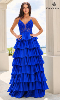 A person wearing the Faviana 11603 royal blue, A-line prom dress with a beaded, V-neck corset bodice and floor-length tiered chiffon ruffles.