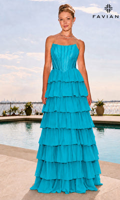 A woman stands by a swimming pool wearing an aqua Long Prom Dress: Faviana 11631, featuring a strapless floor-length design with a satin corset bodice and a tiered ruffled skirt.