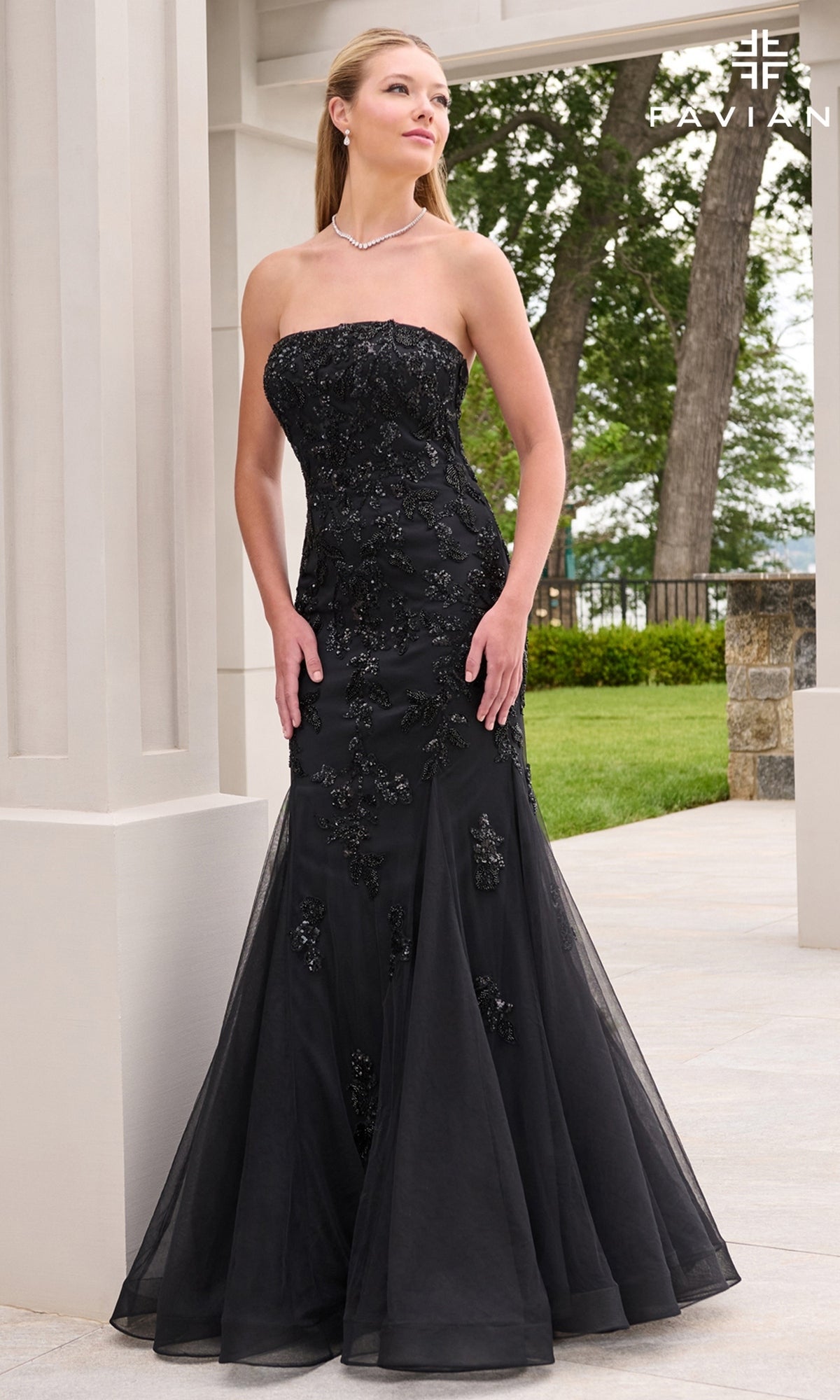 Long Prom Dress: Faviana 11643, a strapless black floor-length gown with a sweetheart neckline and beaded floral appliqués.
