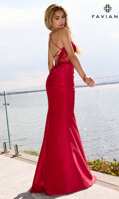 Woman wearing a red Long Prom Dress: Faviana 11646 mermaid gown with a beaded lace bodice and strappy open back, standing on a terrace overlooking the water.