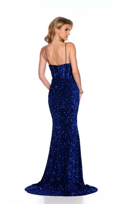A woman models the Long Formal Dress 11652 by Dave and Johnny—an elegant fitted royal blue sequin gown with thin straps—standing against a white background to showcase the stunning back design.